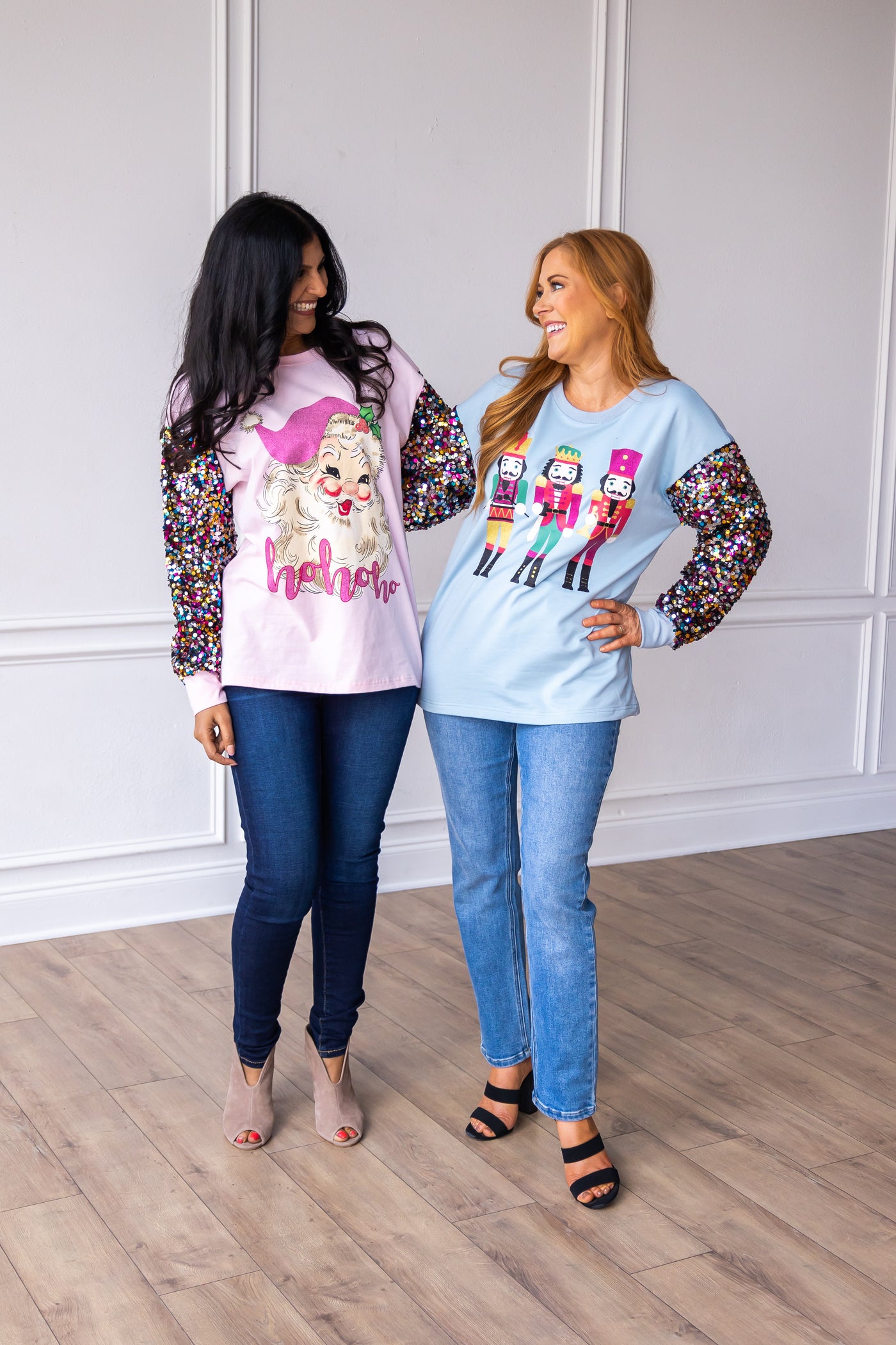 Nutcrackers on Blue Sweatshirt with Sequin Sleeves