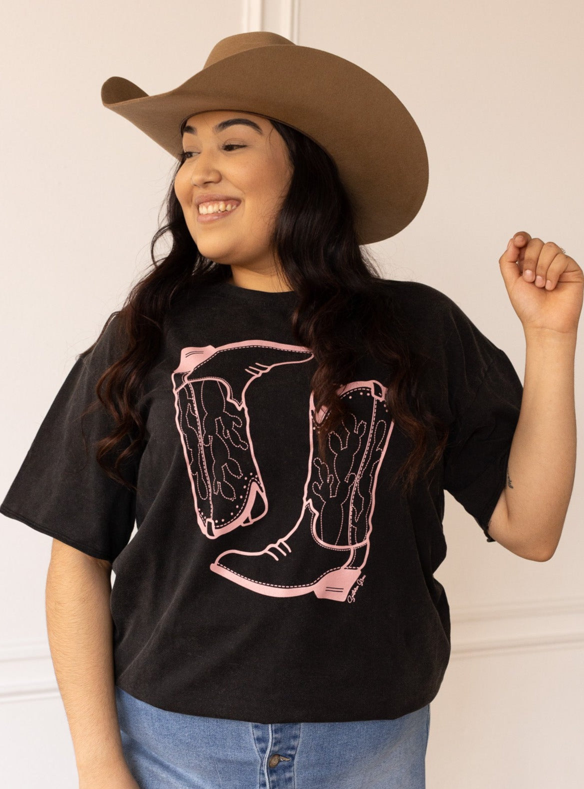 Pink Western Boots on Black Crewneck Tee