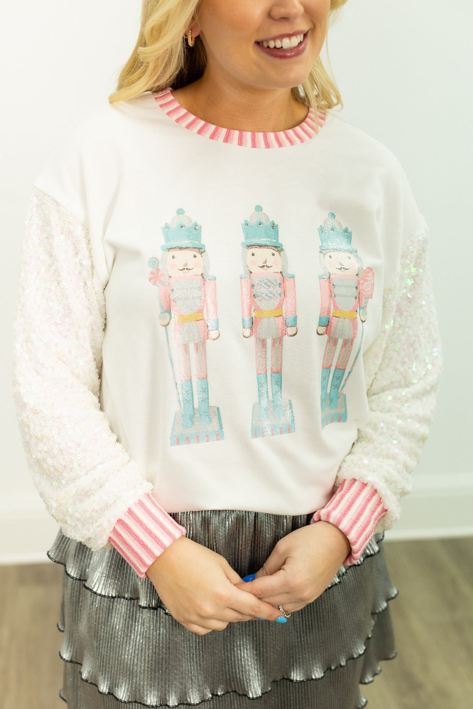 Glitter Nutcrackers on White Top with Sequin Sleeves