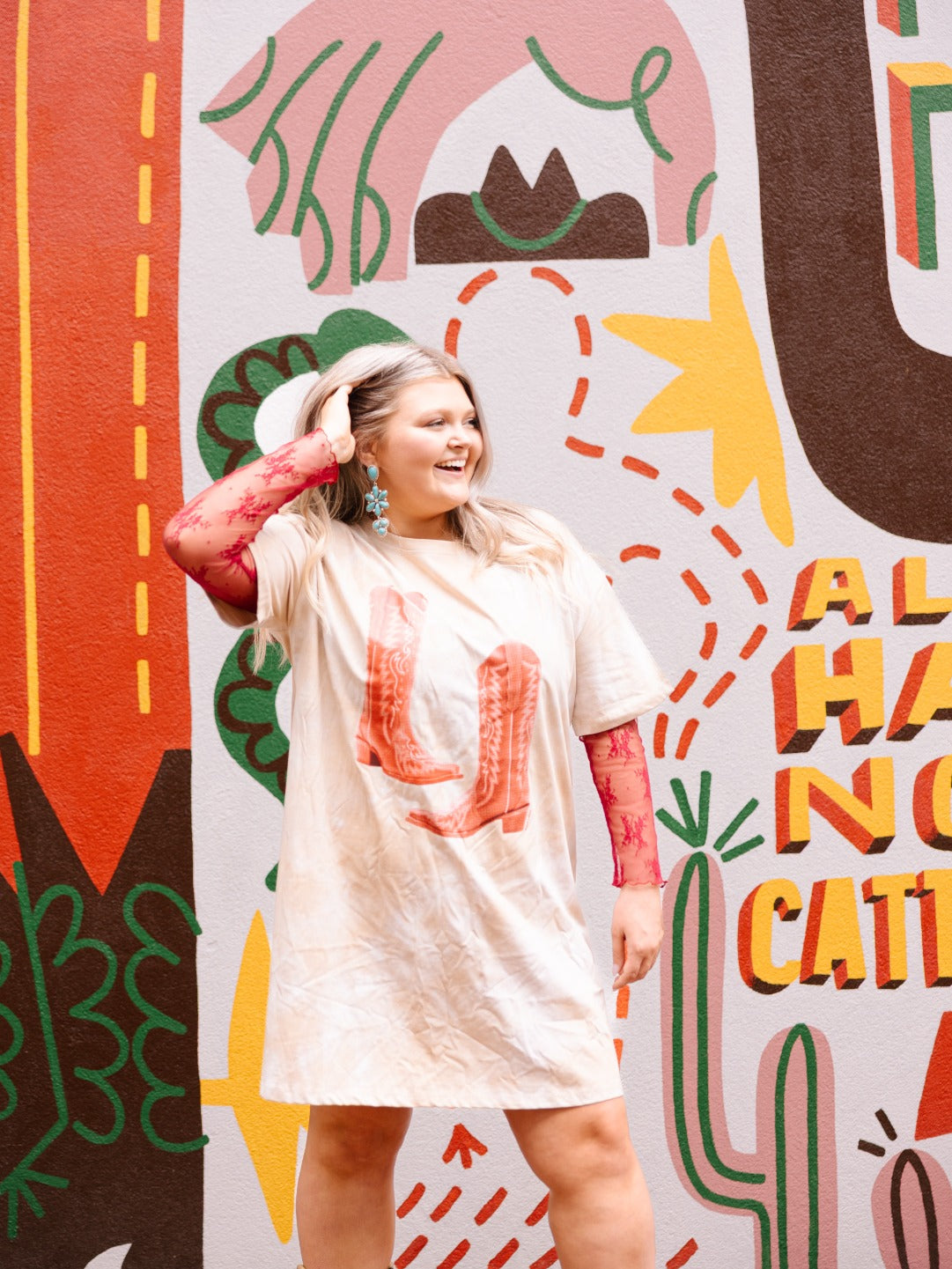 Red Cowgirl Boots on Beige Tie Dye T-Shirt Dress