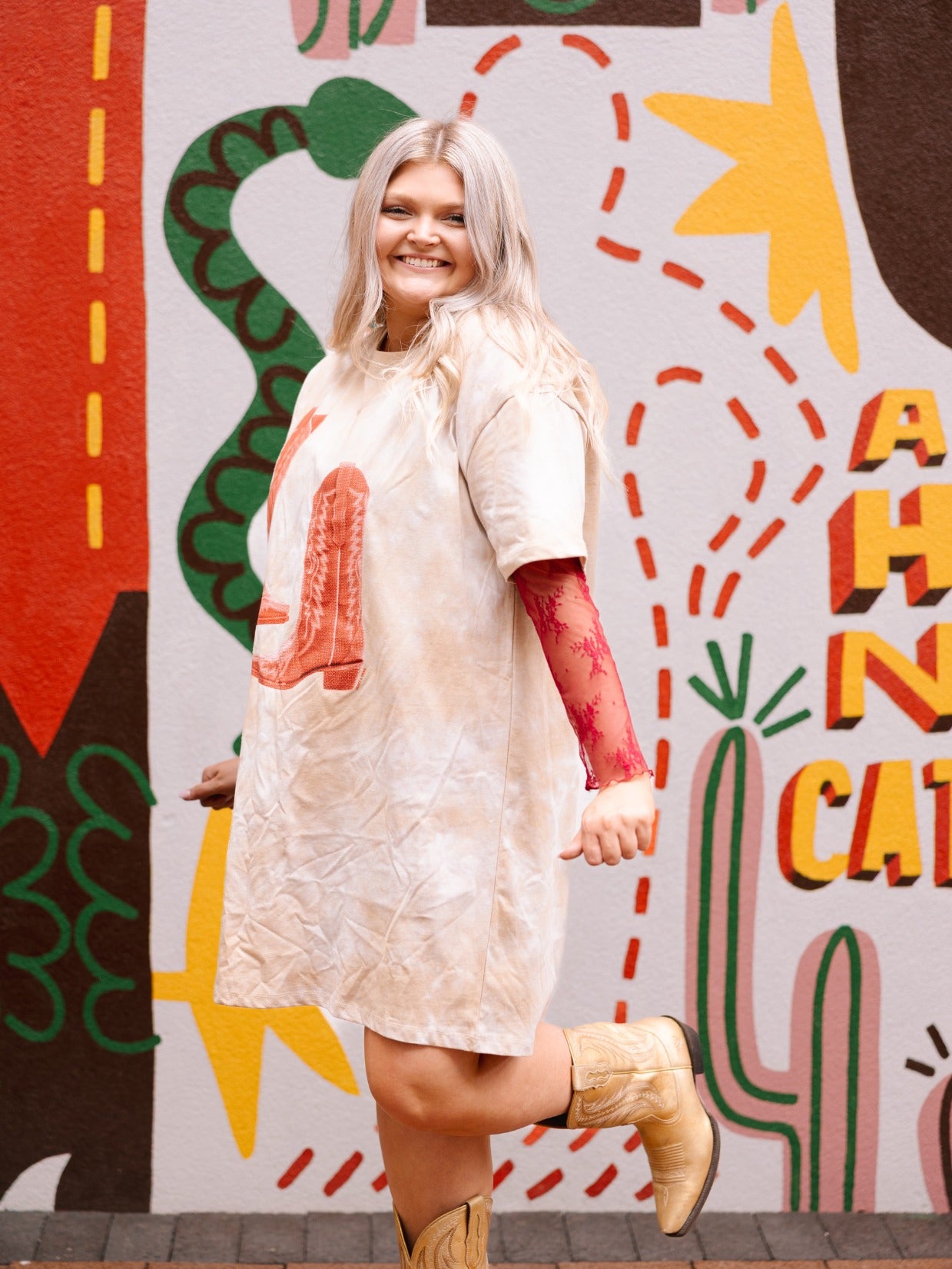 Red Cowgirl Boots on Beige Tie Dye T-Shirt Dress